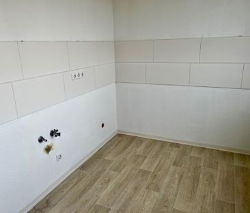 Helle 4-Raum-Wohnung mit zwei Balkonen und saniertem Bad im 4. OG - Photo 6