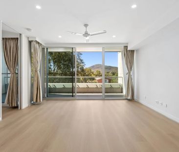 Stylish North-Facing 1-Bedroom Apartment with Sweeping Mountain Views - Photo 1