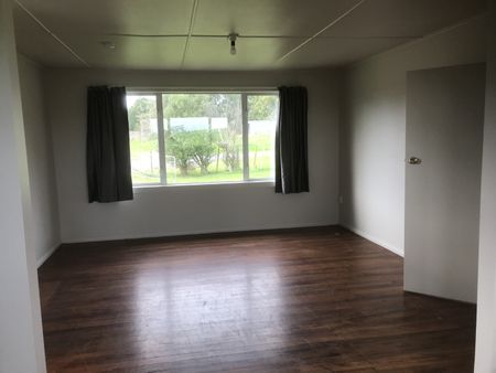 This home is need of a family, it has three bedrooms - one is of single size, open plan living, dining and kitchen, wooden floors throughout, bathroom with shower and toilet, separate laundry with a second toilet, double glazed, new coat of paint inside and out, and new curtains. - Photo 3