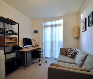 A modern, well presented second floor apartment, situated on the re... - Photo 4