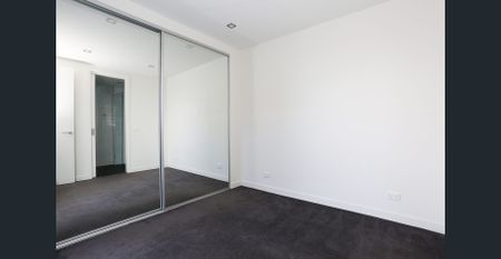 Modern top floor apartment set in secure complex - Photo 2