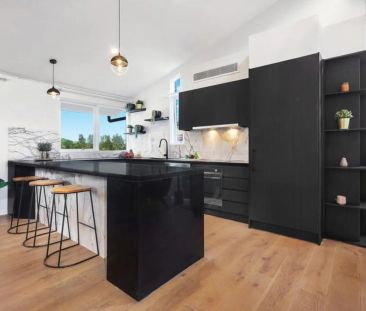 Modern Family Retreat in a Peaceful Setting! - Photo 1