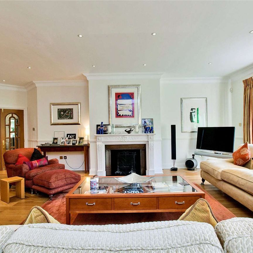 Situated in grounds of just over half an acre and located in one of Esher's most sought after private roads close to High Street. - Photo 1