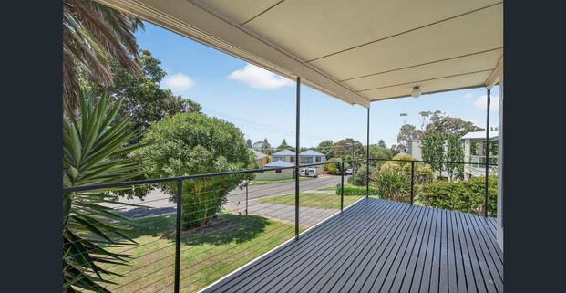 Open the door to elevated coastal living - Photo 1