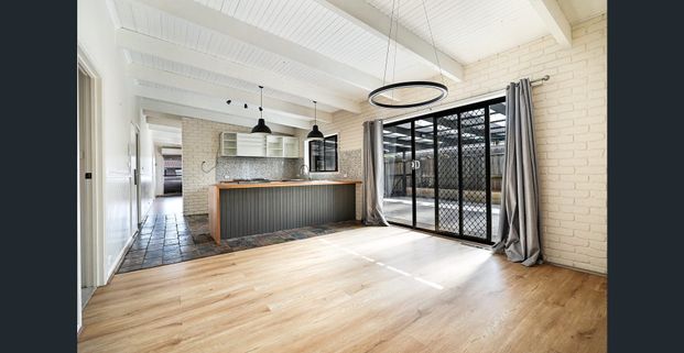 Charming Family Home in a Quiet Court with a Huge Shed for Your Use - Photo 1