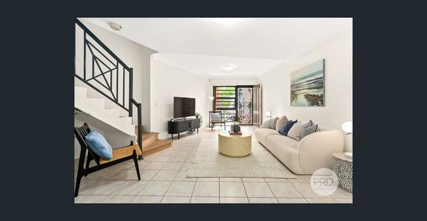 Modern Full Brick Townhouse Three Bedroom Two Bathroom with Tendem Garage! - Photo 1