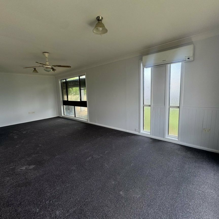 Updated Three-Bedroom Home with Swimming Pool - Photo 1