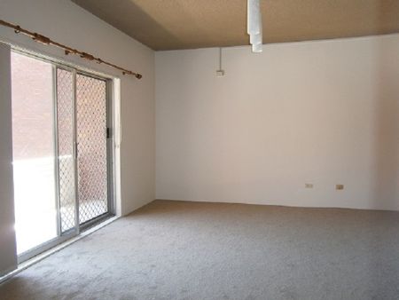 Two Bedroom Unit with Garage - Photo 3