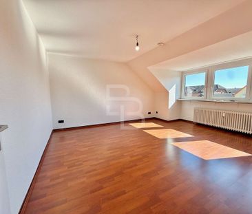 Gemütliche Dachgeschosswohnung in zentraler Lage von Ensen! - Photo 1