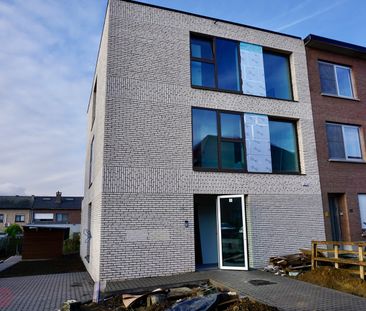 Nieuwbouw gelijkvloersappartement met 2 slaapkamers en tuin. - Photo 4