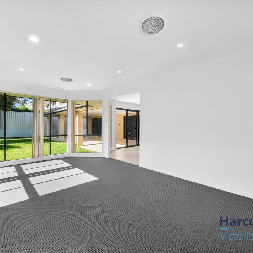 HUGE FAMILY HOME WITH ALL THE BELLS & WHISTLES! - Photo 1