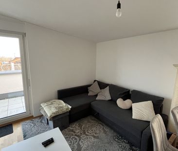 Moderne DG-Wohnung mit Dachterrasse, Balkon, TG-Platz & Weitblick i... - Photo 2