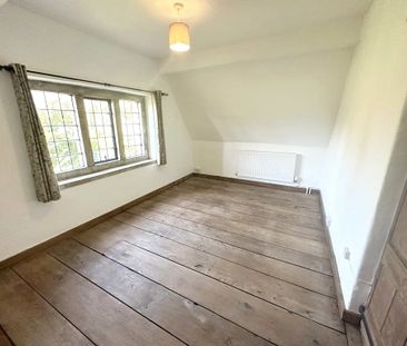A Grade II listed period cottage in this desirable village, built i... - Photo 5