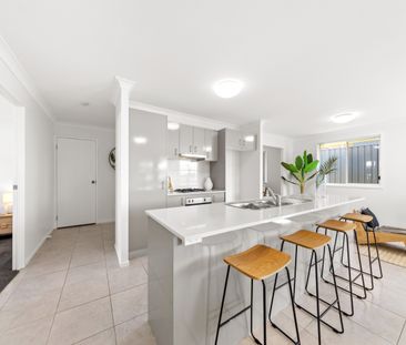 Stylish Family Home in Quiet Wadalba Location - Photo 1