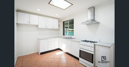 MODERN & SPACIOUS LIVING AT ITS FINEST! - Photo 2