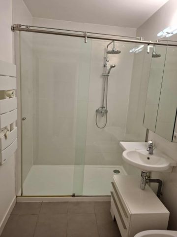 Appartement T3 de 56 m² avec loggia, cave et parking privatif - Photo 2