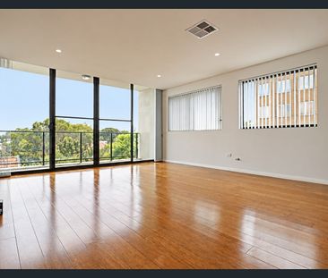 Stylish One-Bedroom Apartment with Brand-New Flooring Throughout - Photo 1