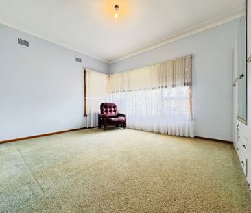 Comfortable Three-Bedroom Home with Optional Part Furnishing - Photo 2