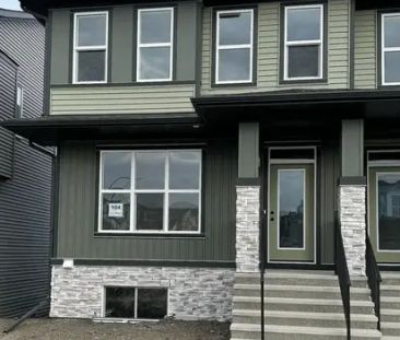 BRAND NEW 4 BEDROOM DUPLEX | 104 Edith Place North West, Calgary - Photo 1