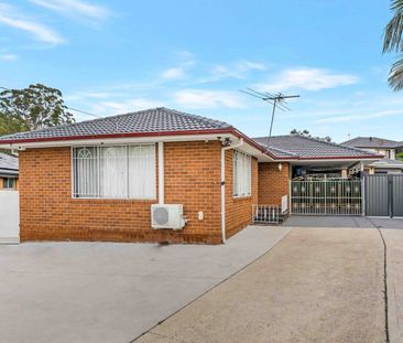 Low-Maintenance Family Home - Photo 1