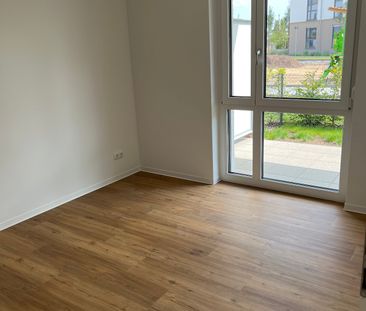 Wohnen in mit eigenem Gartenanteil - Tolle 2-Zimmer-Neubauwohnung m... - Photo 1