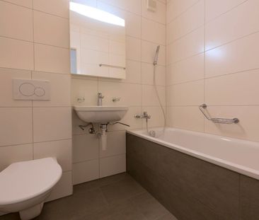 Appartement de 2.5 pièces au rez-de-chaussée - Photo 2