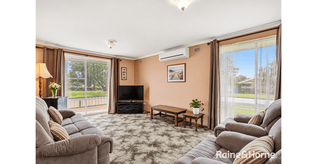 Spacious Family Home with a Generous Backyard! - Photo 1
