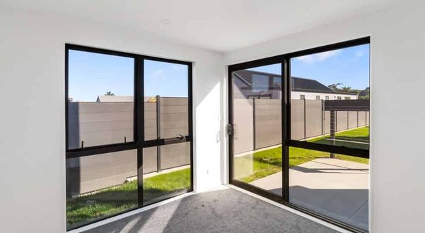 Modern standalone home - coastal living made easy! - Photo 1