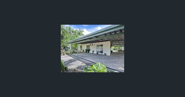BEAUTIFULLY PRESENTED TROPICAL FAMILY OASIS IN SOUGHT-AFTER MOULDEN - Photo 1