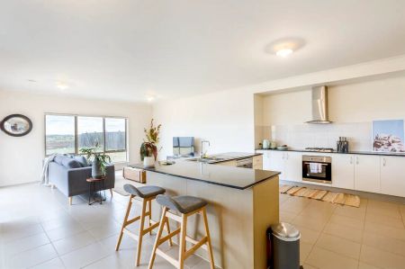 “Modern Family Living in the Heart of Sanctuary Lakes” - Photo 3