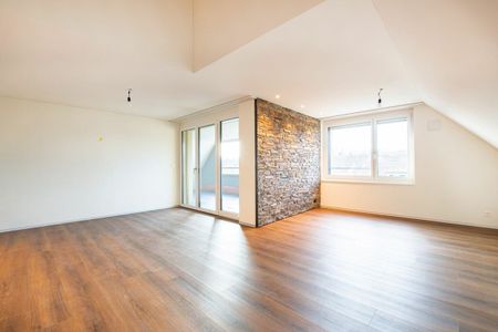 Moderne Maisonette-Wohnung im Herzen von Nänikon - Foto 3