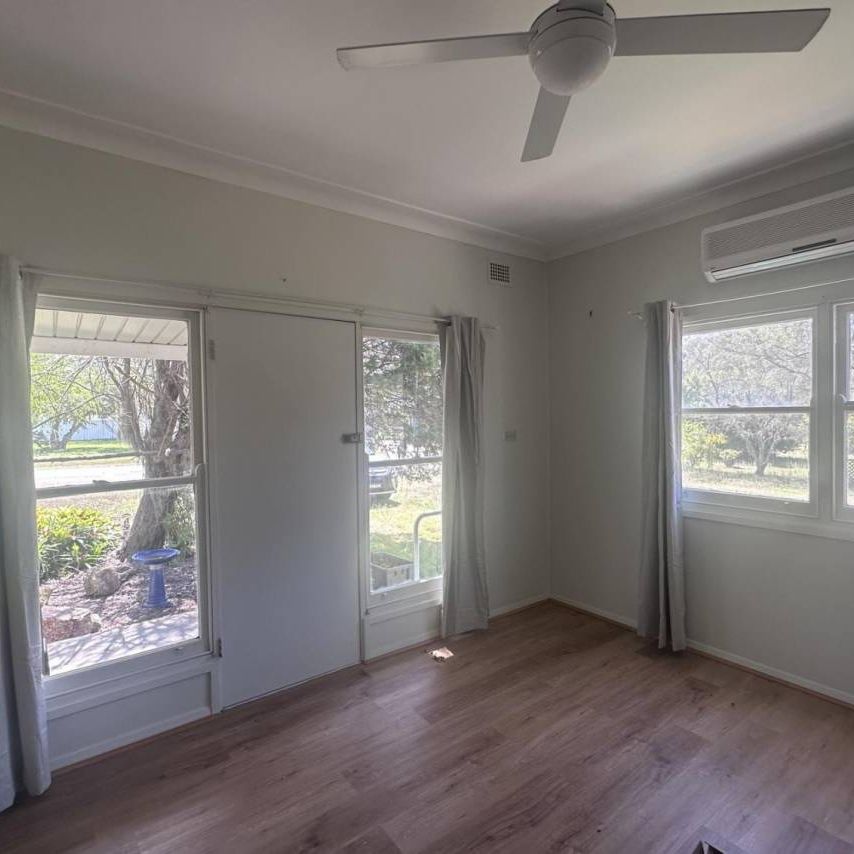 Rural home in the heart of town - Photo 1