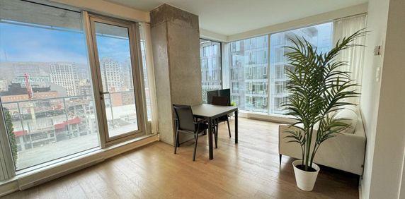 Unité de Coin Lumineuse au Cœur du Centre-Ville de Montréal - Photo 2