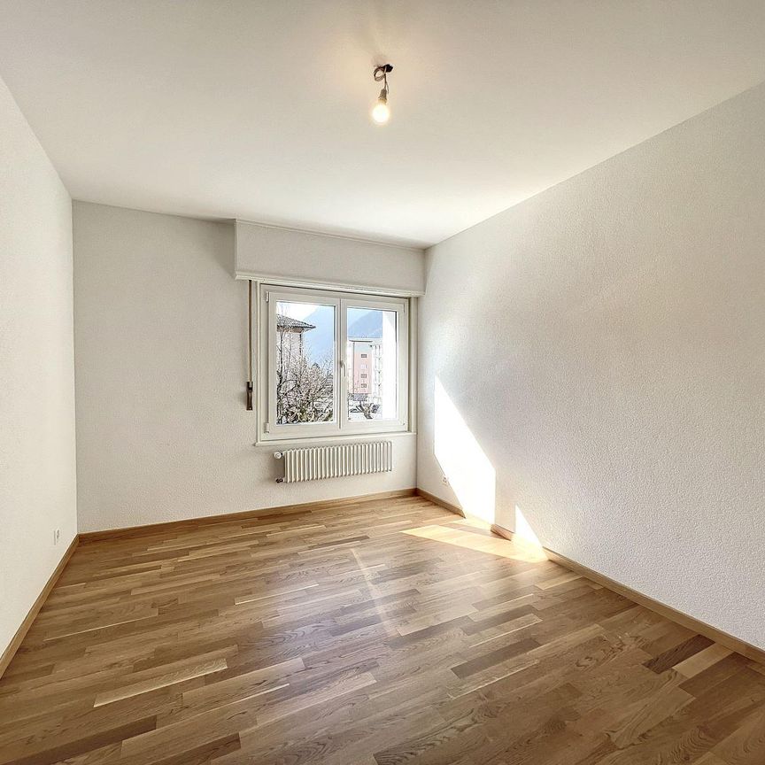 Appartement lumineux de 3.5 pièces au 2ème étage situé dans un quartier calme et verdoyant. - Photo 1