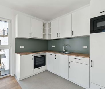 Grün, großzügig, geborgen – 4-Zimmer-Familienwohnung mit Terrasse i... - Photo 1