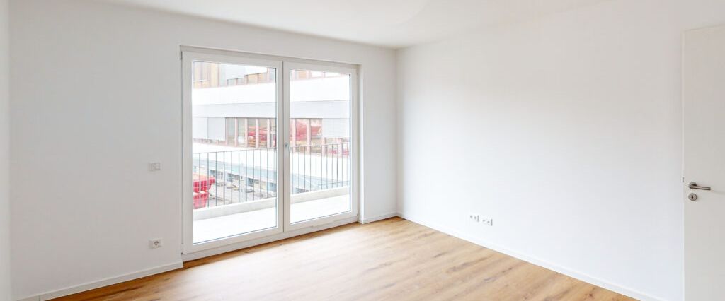 2-Zimmer-Neubauwohnung mit besonderem Schnitt! EBK und Balkon/Terrasse inklusive - Foto 1