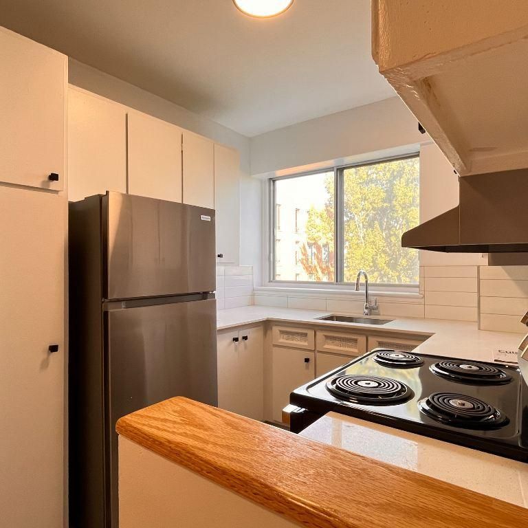 3.5 chauffé à St-Lambert avec piscine sur le toit - Photo 1