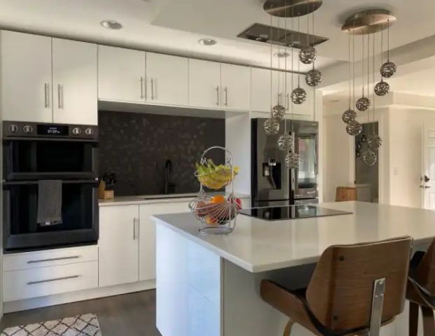 Newly renovated apartment with large backyard. Fully furnished. | 296 Acadia Drive SE, Calgary - Photo 1