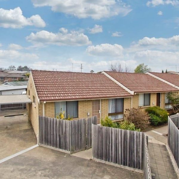 Conveniently located two-bedroom unit - Photo 1