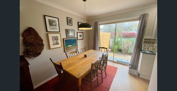 Fully Furnished Two-Bedroom Townhouse in Prime Location! - Photo 1