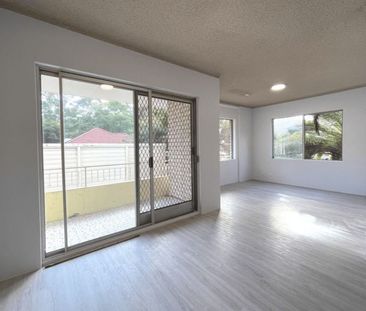 RECENTLY RENOVATED TWO BEDROOM - Photo 1