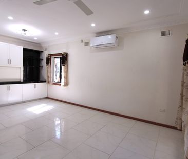 Lovely family home with additional sleep out! Great location with b... - Photo 6