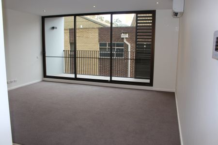 Secure Apartment With Spacious Livingroom And Balcony! - Photo 2