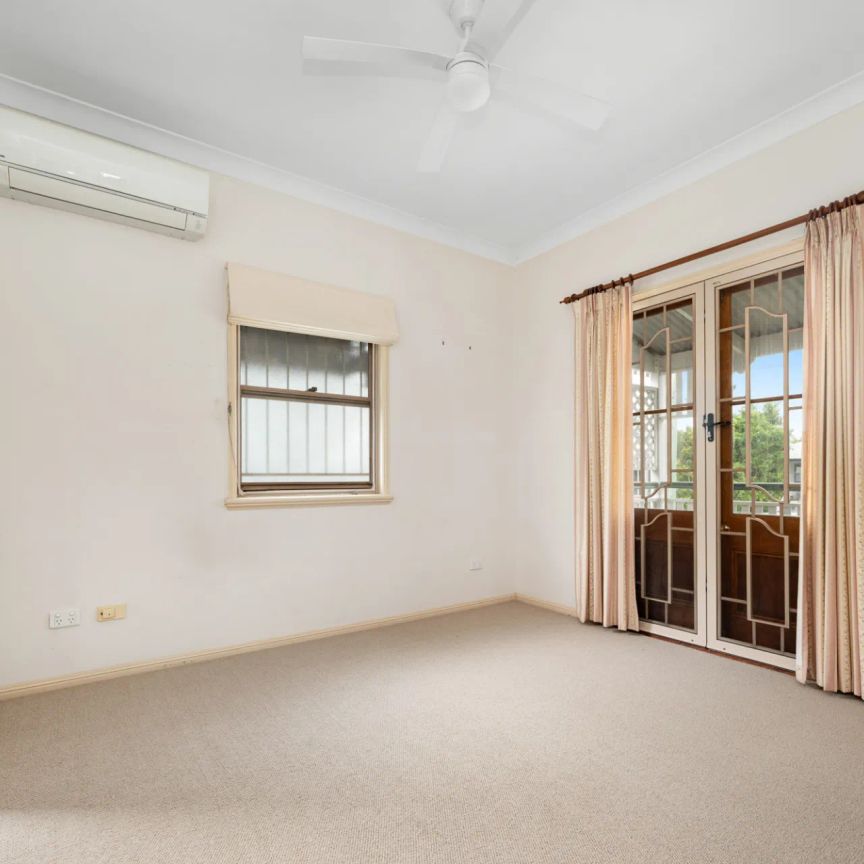 Charming Queenslander with Spacious Backyard & Leafy Entertaining - Photo 1