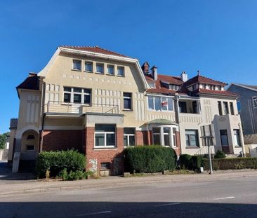 Charmante Duplex-Wohnung mit zwei Parkplätzen und Terrasse in zentr... - Foto 3