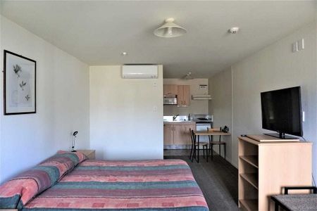 OFF STREET PARKING AND CENTRAL CITY LIVING! - Photo 3