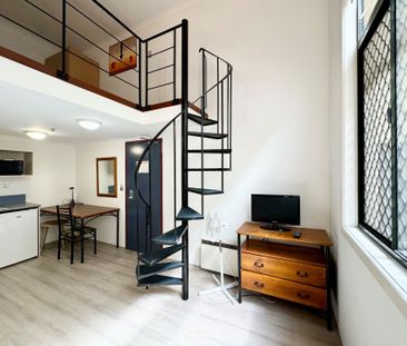 RENOVATED FURNISHED LOFT IN PRIME LOCATION! - Photo 1