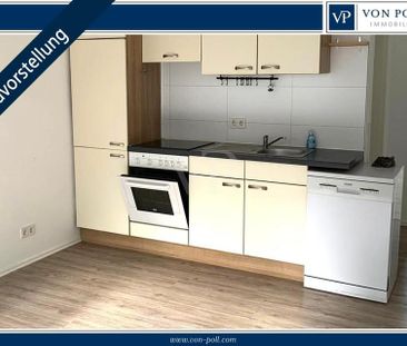 Gepflegte 2-Zimmer-Wohnung mit Einbauküche in zentraler Lage - Photo 5