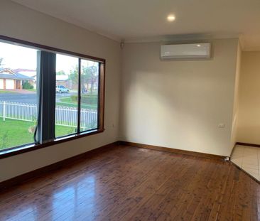4-Bedroom Family Home in Quakers Hill! - Photo 1