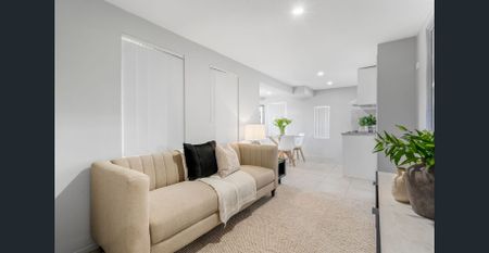 Spacious Renovated Home with Multiple Living Areas + Kitchenette - Photo 3